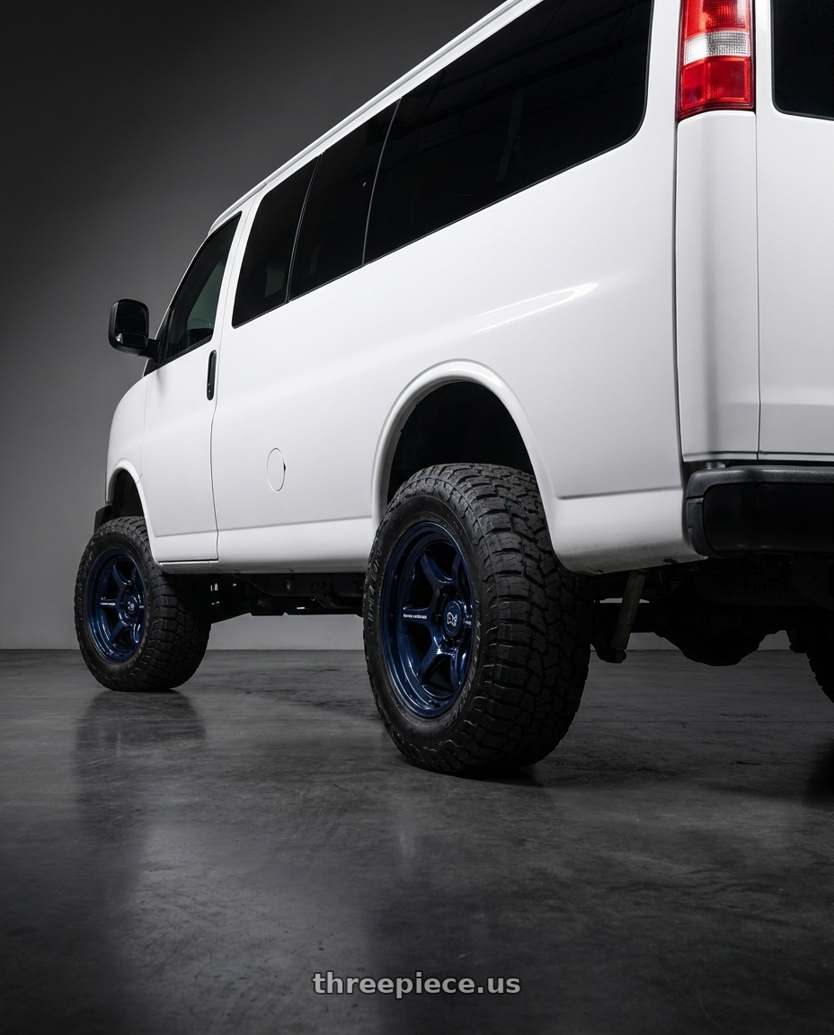 2018 Chevy express  with Black Rhino SHOGUN 6X139.7 17X9 -38 GLOSS MIDNIGHT BLUE wheels rear three quarter view meaty tires