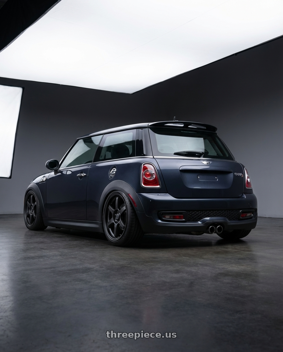 2010 Mini Cooper S R56 with Konig Backbone 4x100 17x7.5+45 Matte Black Milling Logo on Spoke wheels rear three quarter view slight stretch tires