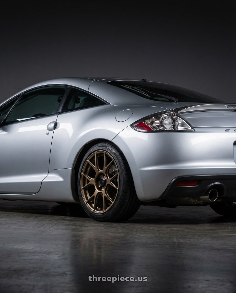 2010 Mitsubishi Eclipse with Konig Ampliform 5x114.3 18x10+20 Gloss Bronze wheels rear three quarter view square tires