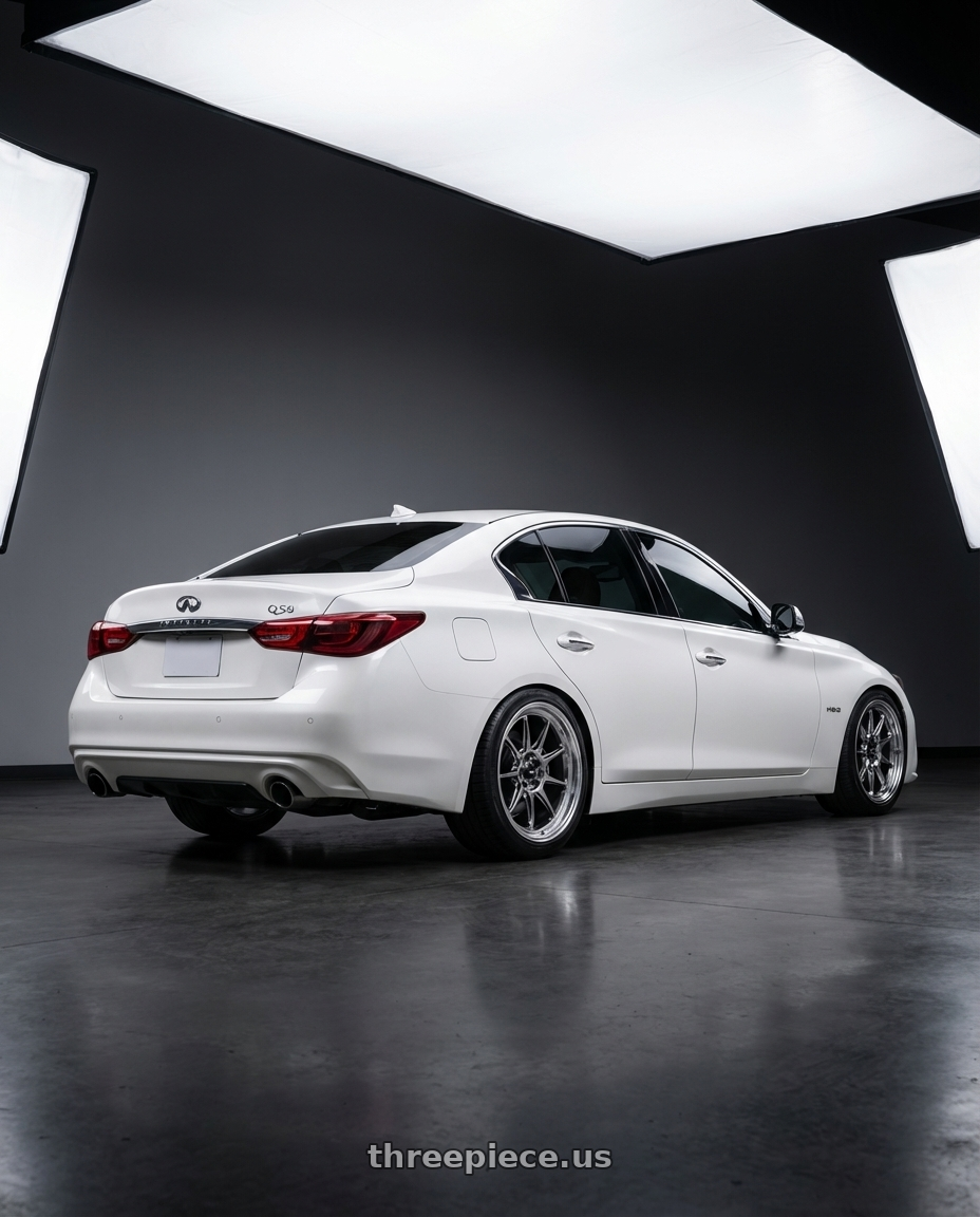 2020 Infiniti Q50 with Konig Countergram 5x114.3 19x11+18 Hyper Chrome / Machined Lip wheels rear three quarter view square tires