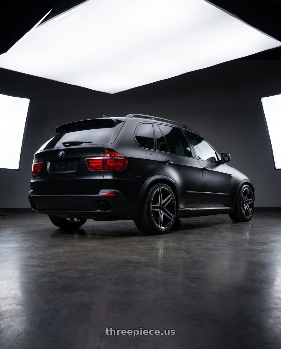2010 BMW x5, satin black with REPLICA WHEELS R5055 5x112 20x9.5+35 BLACK / MACHINED wheels rear three quarter view slight stretch tires