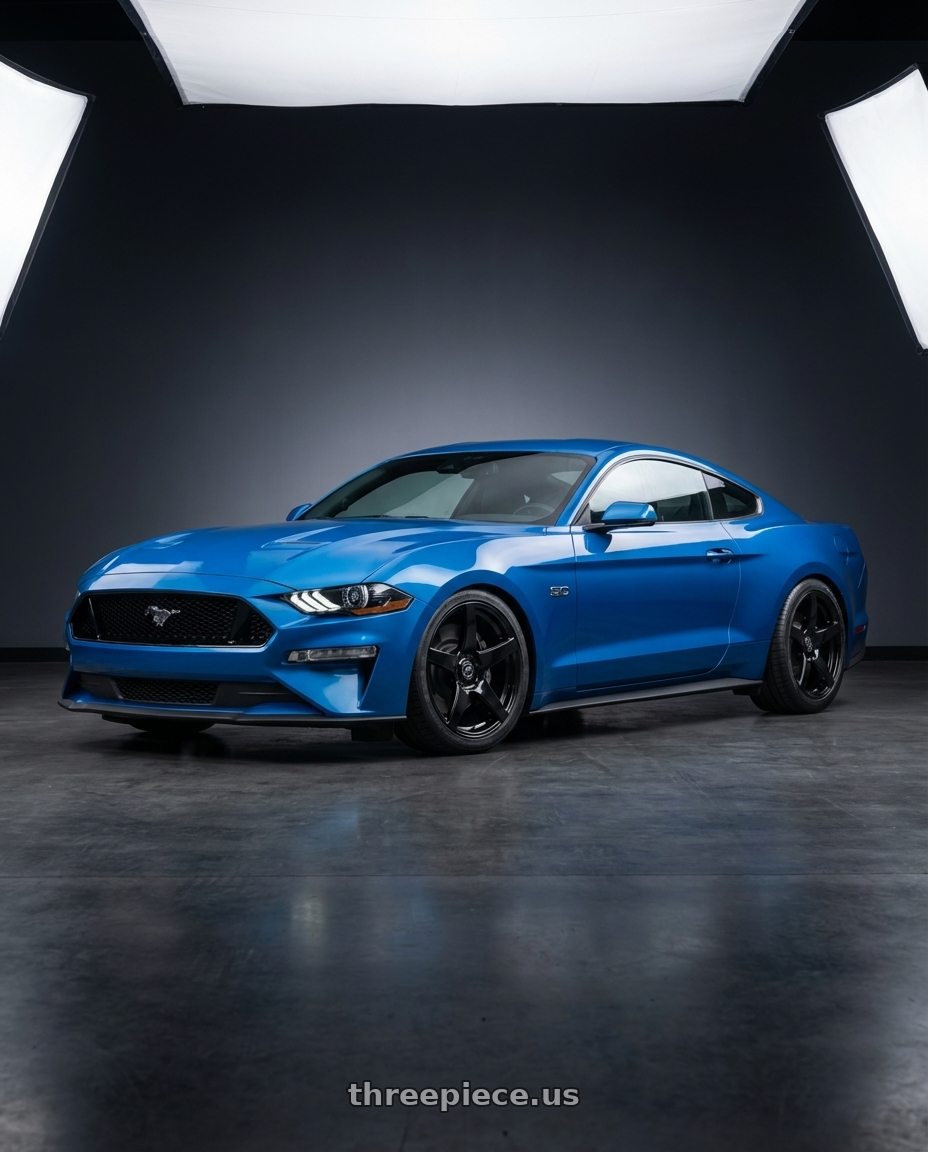 2022 Ford Mustang GT with Forgestar CF5 5x114.3 19x9 +35 Gloss Black wheels front three quarter view lowered stance