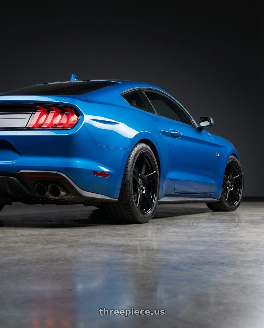 2022 Ford Mustang GT with Forgestar CF5 5x114.3 19x9 +35 Gloss Black wheels rear three quarter view square tires