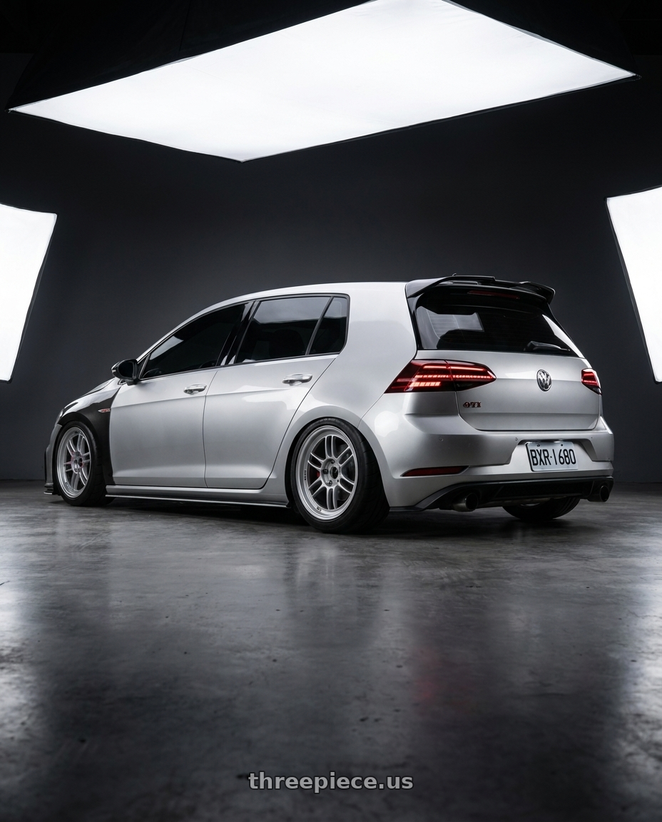 2020 golf 7.5 GTI with Enkei RPF1 5x112 18x8+35 Silver wheels rear three quarter view meaty tires