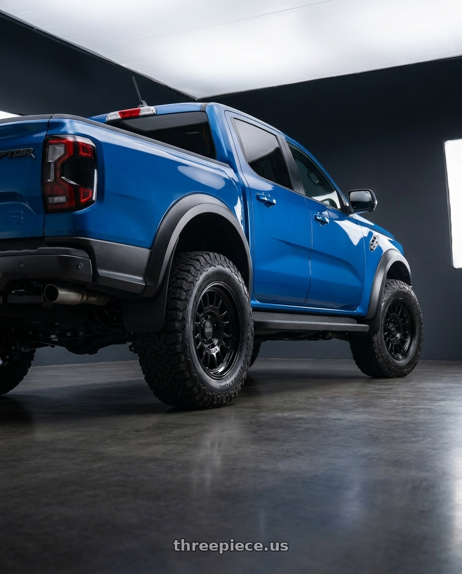 2024 ford ranger raptor with Method Race Wheels 318B 6X135 17x8.5 +0 GLOSS BLACK wheels rear three quarter view square tires