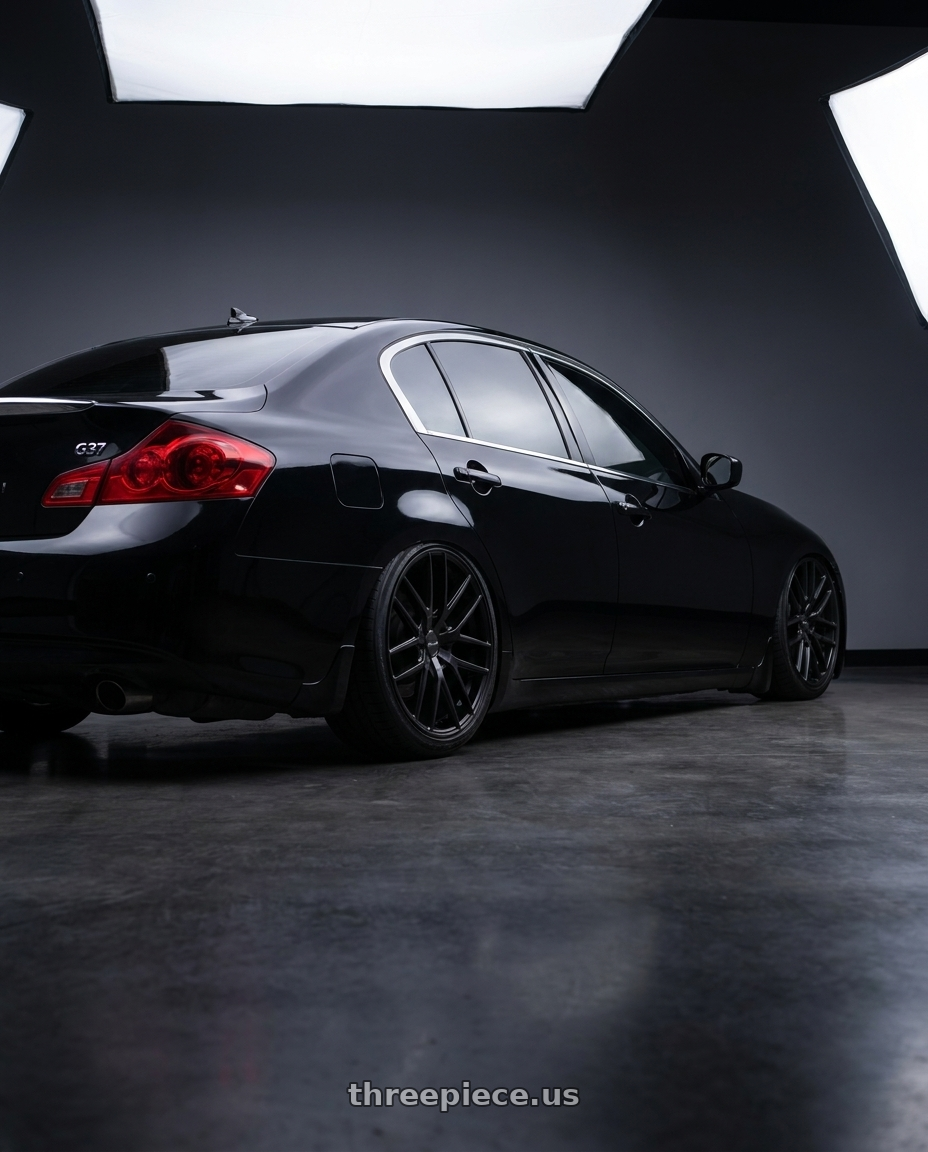 2013 Infiniti g37 journey with TOUREN TR60 3260 5x108/5x114.3 19x8.5 +40 MATTE BLACK wheels rear three quarter view slight stretch tires
