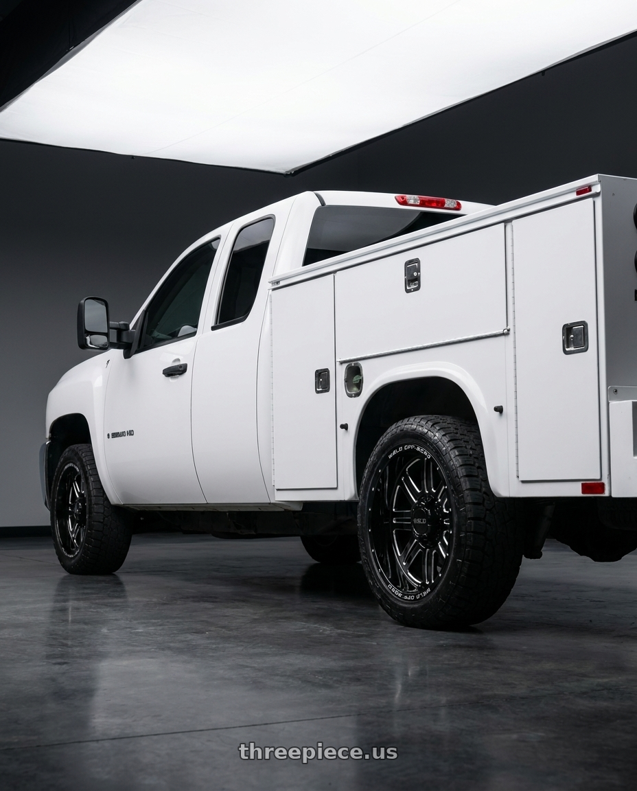 2009 Chevy Silverado with WELD Off-Road Chasm 8x165.1 18x9 0 Gloss Black/Milled wheels rear three quarter view square tires