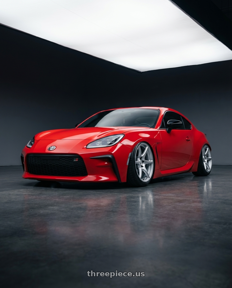 2024 Toyota GR86 with Kansei K11S Tandem 5x114.3 18x10.5 12 Hyper Silver wheels front three quarter view stanced stance