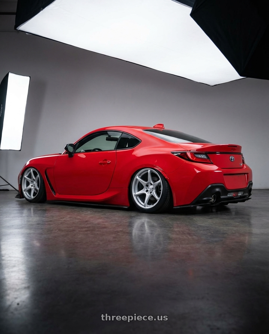 2024 Toyota GR86 with Kansei K11S Tandem 5x114.3 18x10.5 12 Hyper Silver wheels rear three quarter view slight stretch tires