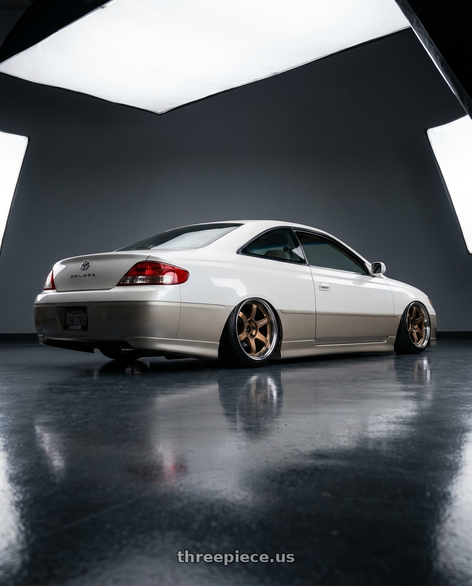 1999 Toyota Solara with Volk Racing 21C SPEC-SR 5x114.3 18x10.5 +15 SHINING BRONZE METAL / RIM DC wheels rear three quarter view slight stretch tires