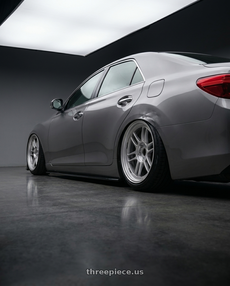 2014 Toyot reiz with Enkei RPF1 5x114.3 18x8.5+30 Silver wheels rear three quarter view slight stretch tires