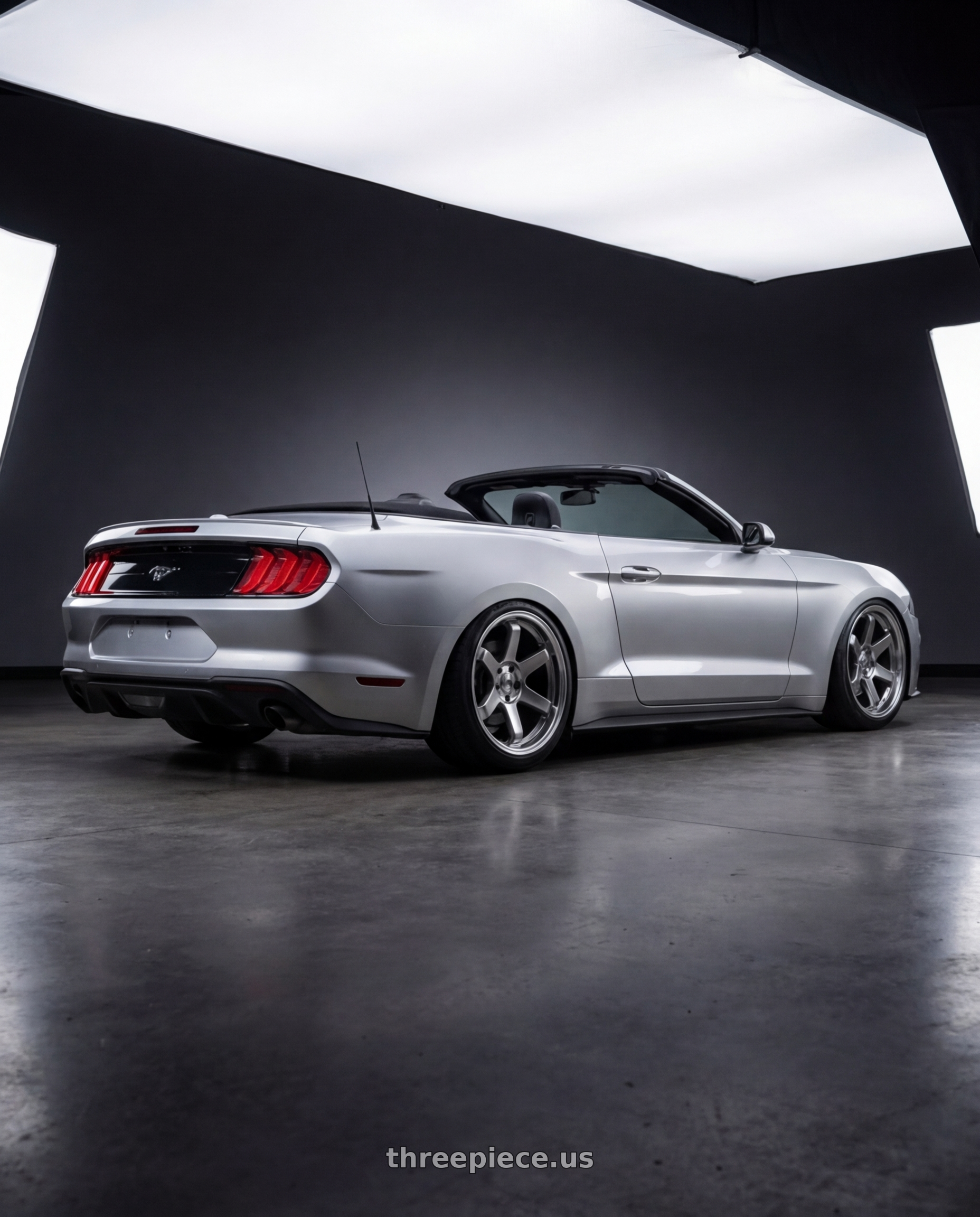 2018 ford mustang with F1R F106 5x114.3 18x9.5 +22 Hyper Black wheels rear three quarter view extreme stretch tires