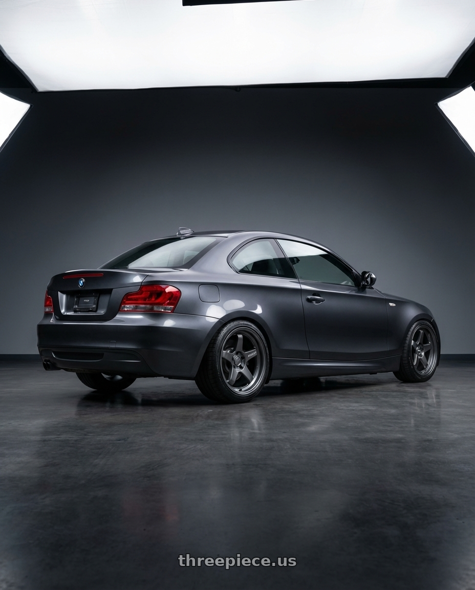 2012 BMW 1 Series E82 with Kansei K12G KNP 5X120 18x10.5 12 Gunmetal wheels rear three quarter view square tires