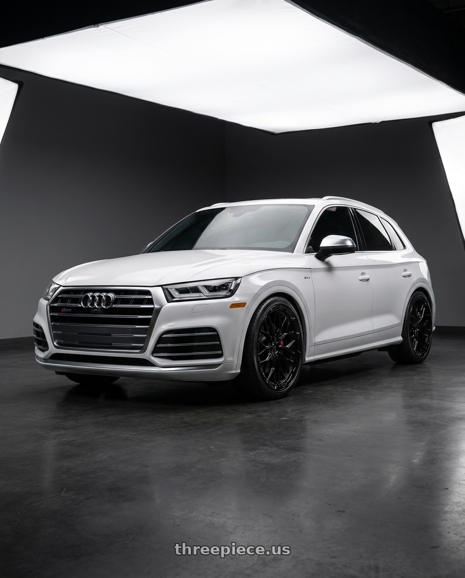 2018 Audi SQ5 Premium Plus with DOLCE PERFORMANCE MAGARI 5x112 20x9 +30 Gloss Black wheels front three quarter view lowered stance