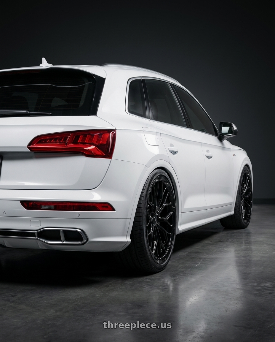 2018 Audi SQ5 Premium Plus with DOLCE PERFORMANCE MAGARI 5x112 20x9 +30 Gloss Black wheels rear three quarter view square tires