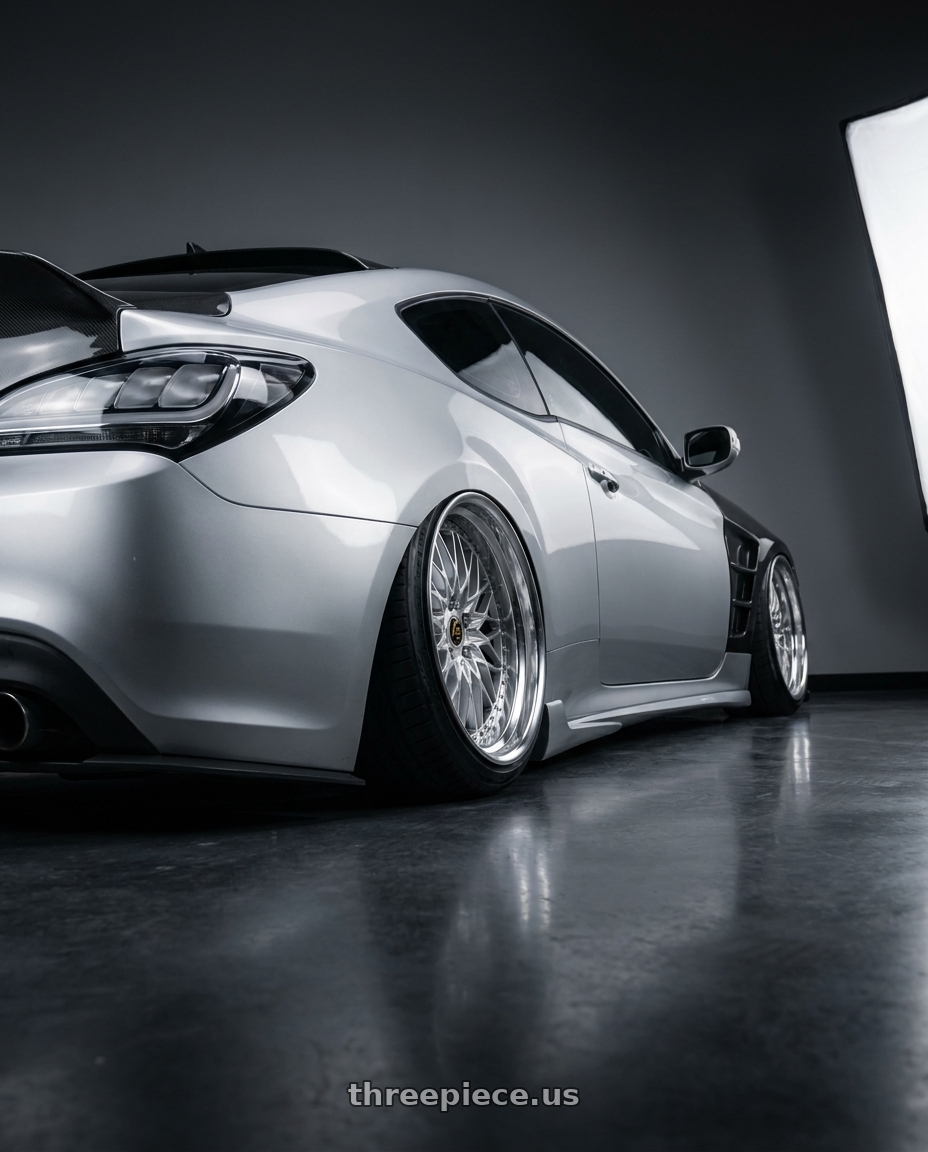 2013 Hyundai Genesis Coupe with Work Vs-Xv 5x114.3 19x10.5-3 L Disk Silky Rich Silver wheels rear three quarter view extreme stretch tires