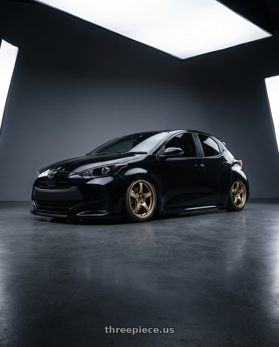 2021 Toyota Yaris with Gram Lights 57CR 5x100 17x9 +38 Almite Gold wheels