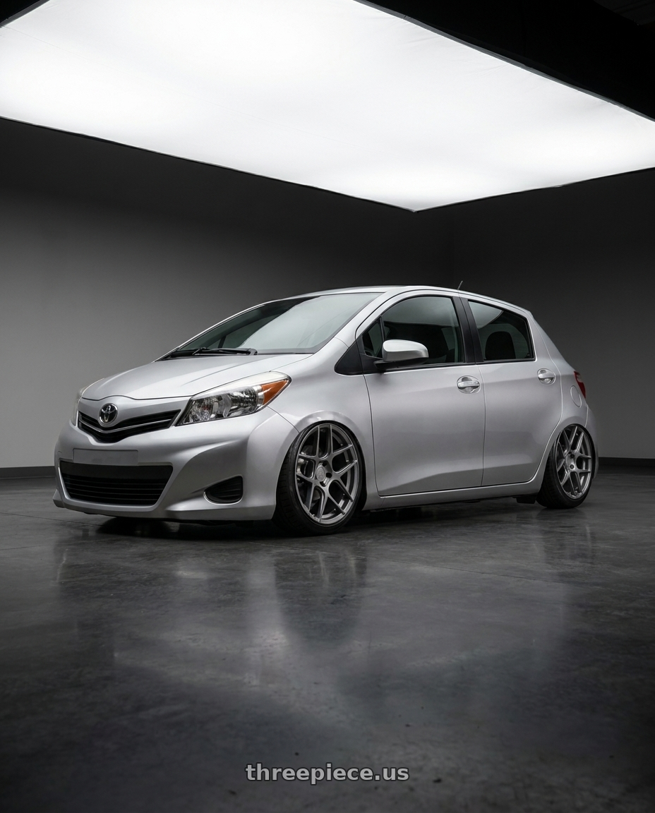 2015 Toyota Yaris with Aodhan AFF2 5x112 19x9.5+35 Matte Gray wheels