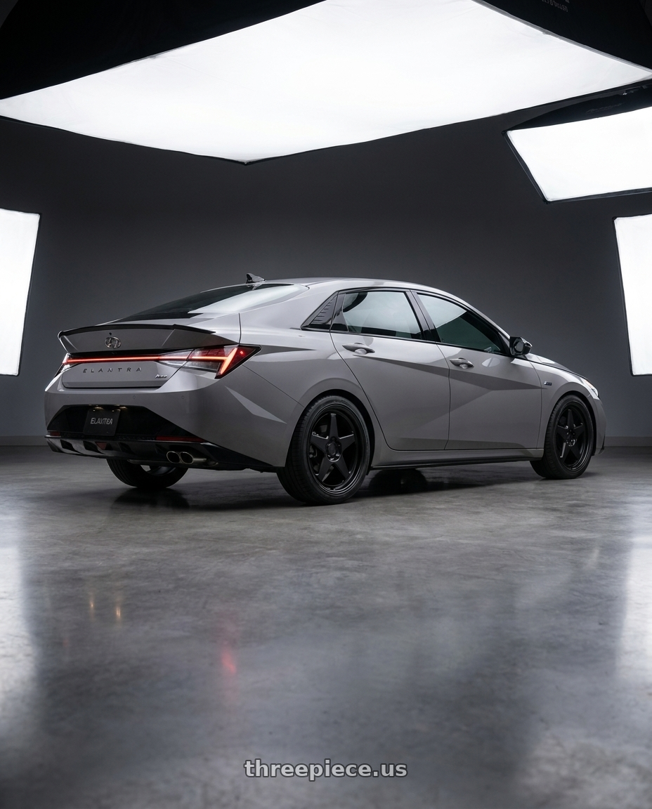 2023 Hyundai Elantra n line with KATANA RACING KR03 5x114.3 20x8.5 +40 Matte Black wheels rear three quarter view square tires