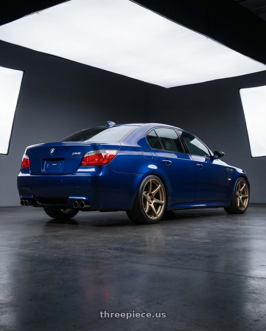 2010 BMW M5 E60 with Kansei K11B Tandem 5X120 19x9.5 22 Bronze wheels rear three quarter view square tires