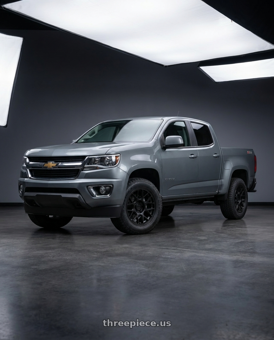 2021 Chevrolet Colorado WT with KMC KM730 HATCHET 6X120 17X8.5 +25 MATTE BLACK wheels