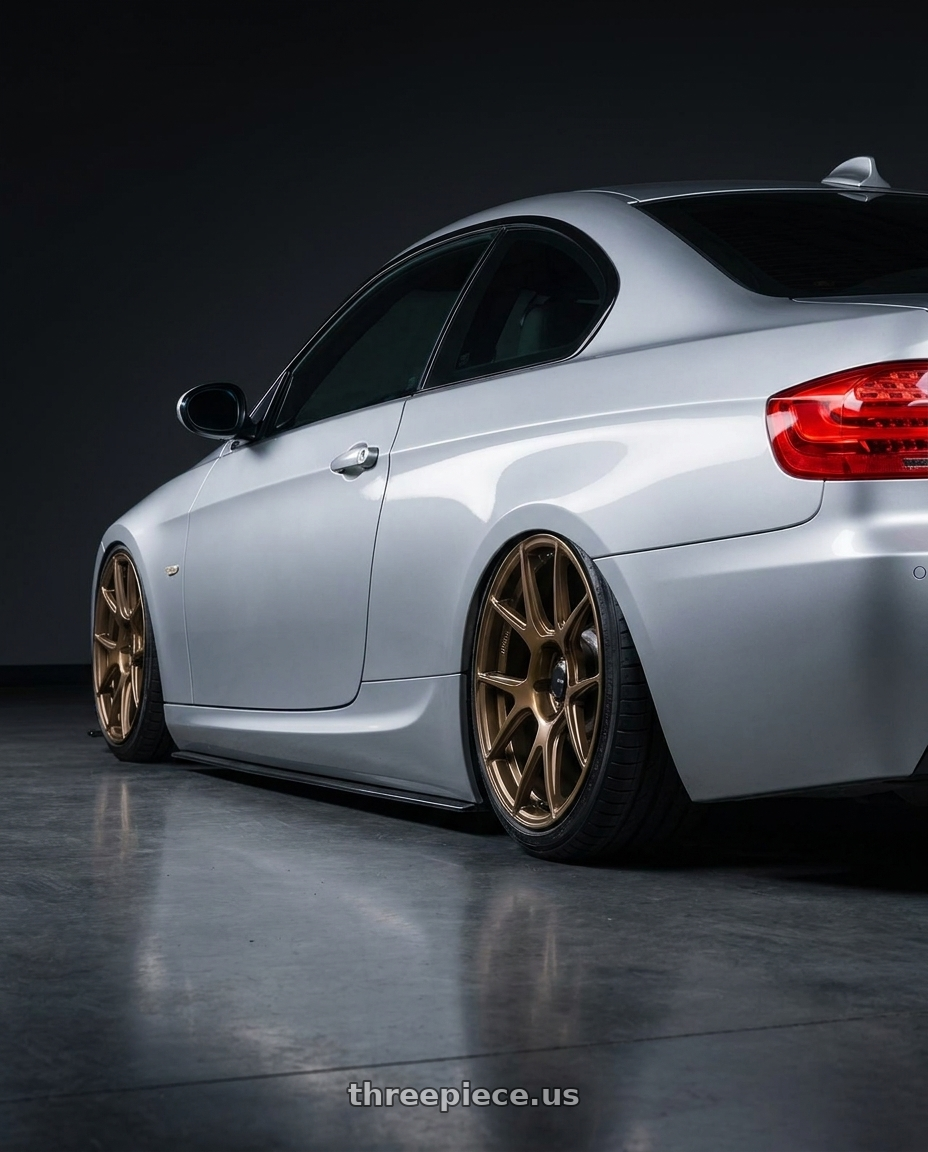 2012 BMW 3 Series E92 with Konig Ampliform 5x120 18x9.5+35 Gloss Bronze wheels rear three quarter view slight stretch tires