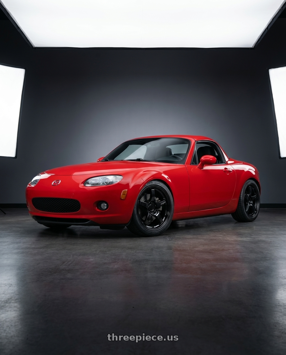2012 Mazda MX-5 Miata NC with Gram Lights 57CR 5x114.3 17x9+12 Glossy Black wheels front three quarter view lowered stance