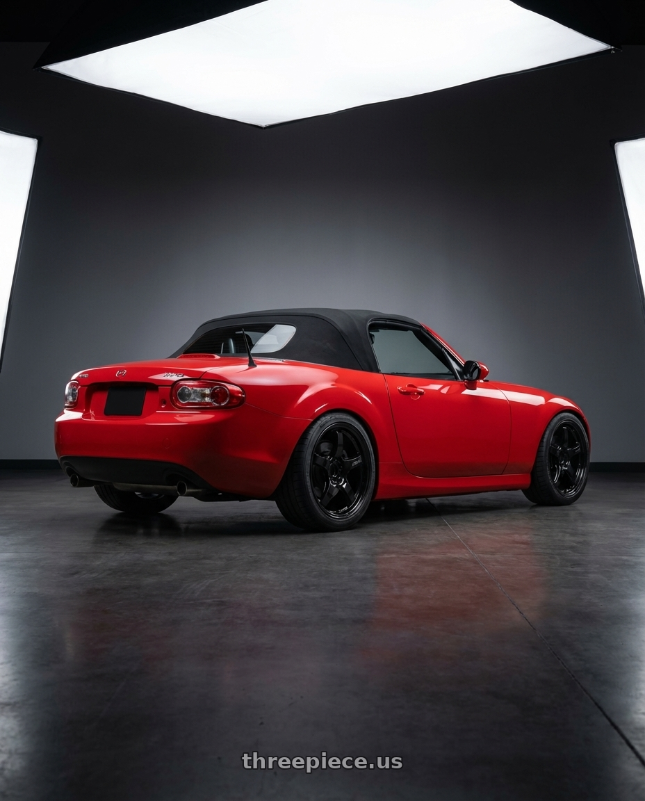 2012 Mazda MX-5 Miata NC with Gram Lights 57CR 5x114.3 17x9+12 Glossy Black wheels rear three quarter view square tires