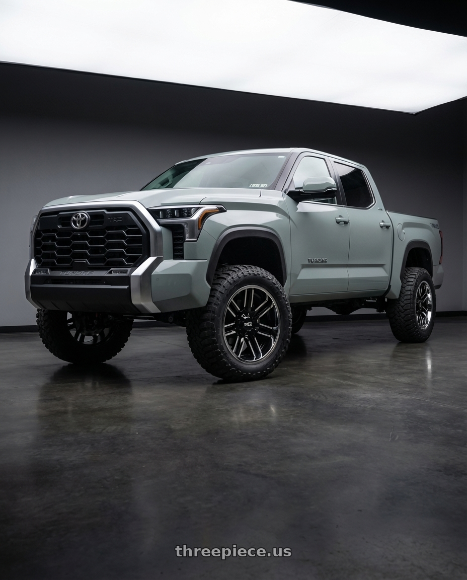 2024 Toyota Tundra with Moto Metal MO202 6X139.7 22X10 -18 GLOSS BLACK MACHINED CENTER CHROME LIP wheels front three quarter view lifted stance