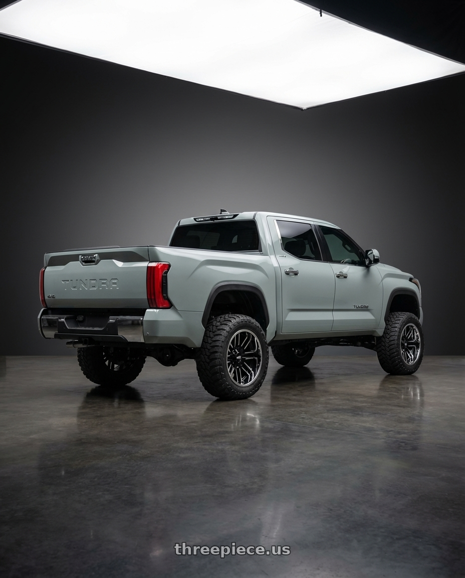 2024 Toyota Tundra with Moto Metal MO202 6X139.7 22X10 -18 GLOSS BLACK MACHINED CENTER CHROME LIP wheels rear three quarter view meaty tires