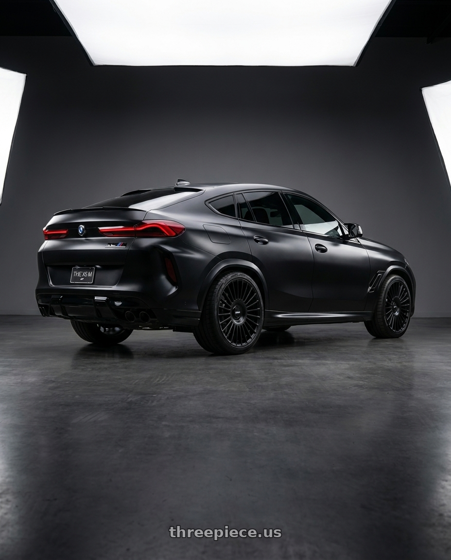 2021 x6 m competition  with Rotiform RC202 GRZ 5X112/5X120 20x10 +40 MATTE BLACK wheels rear three quarter view slight stretch tires