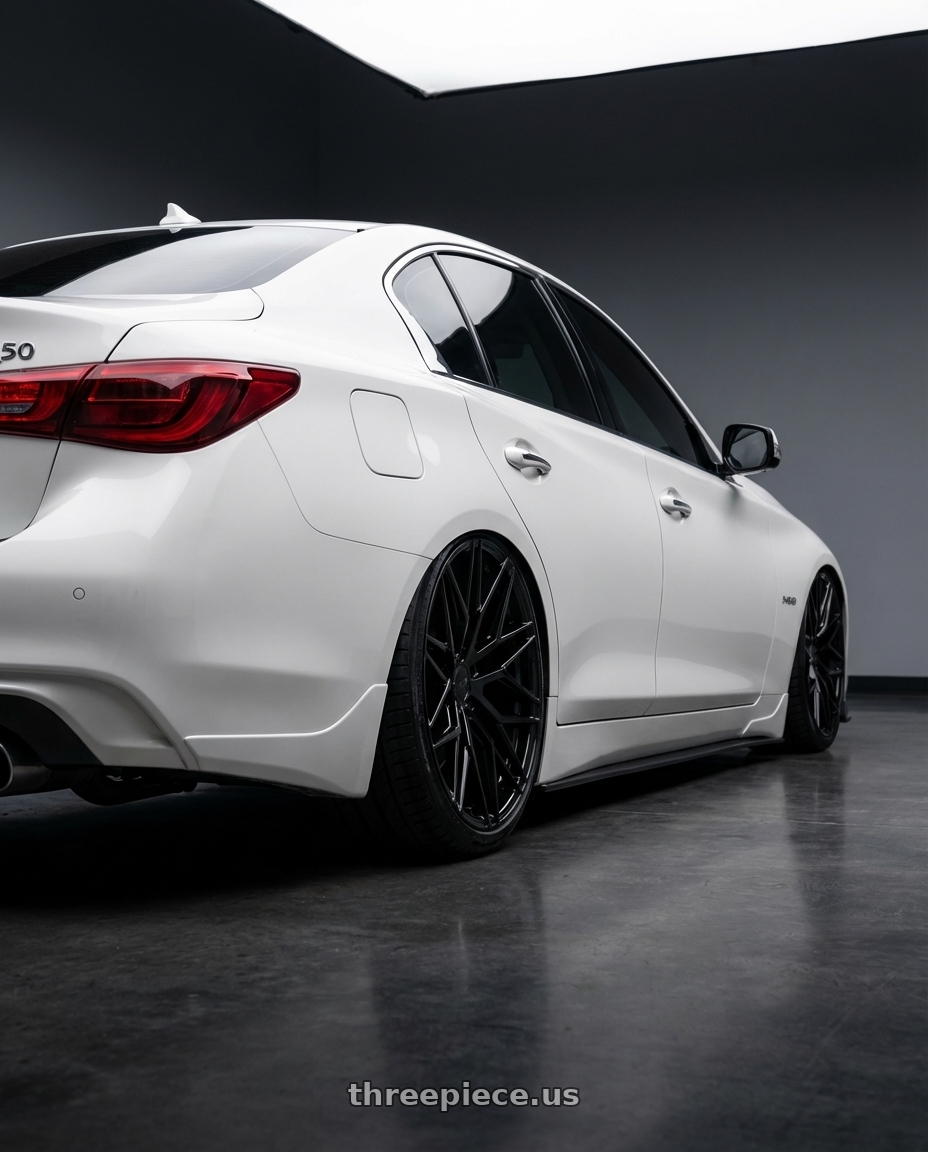 2020 Infiniti Q50 with Avant Garde Wheels M520R 5X114.3 20x10.5 +45 Gloss Black wheels rear three quarter view slight stretch tires