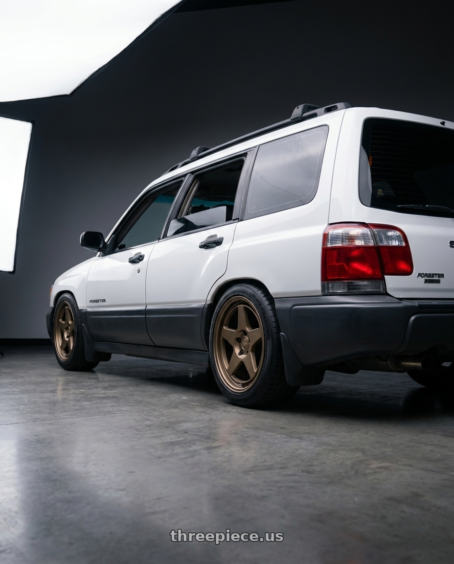 2001 Subaru Forester L with Kansei K12B KNP 5X100 17x9 35 Bronze wheels rear three quarter view square tires