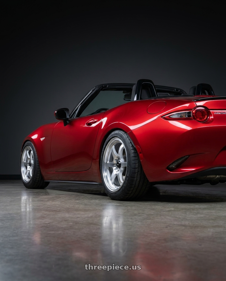 2016 Mazda Miata with Vors LT61 4x100/4x114.3 16x7 +35 Silver Machined Face wheels rear three quarter view meaty tires
