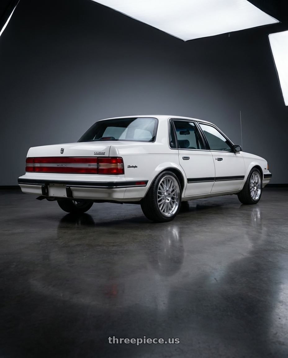 1990 buick century limited white with Petrol P4C 5X100 16X7 +40 SILVER W/ MACHINED FACE & LIP wheels rear three quarter view slight stretch tires