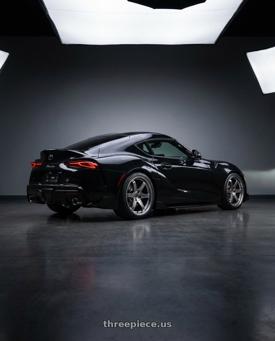2026 Toyota GR Supra with Volk Racing TE37SL 5x112 19x9.5 +22 FORMULA SILVER wheels rear three quarter view square tires