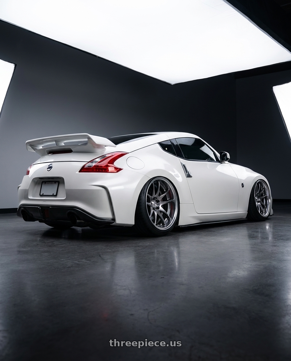 2018 Nissan 370z with Work Cr 2P 5x114.3 19x9.5 +18 GT Silver wheels rear three quarter view extreme stretch tires