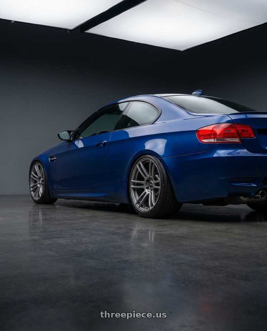 2008 Bmw e92m3 with Enkei TSR-6 5x114.3 18x8.5+38 Titanium Gray wheels rear three quarter view slight stretch tires