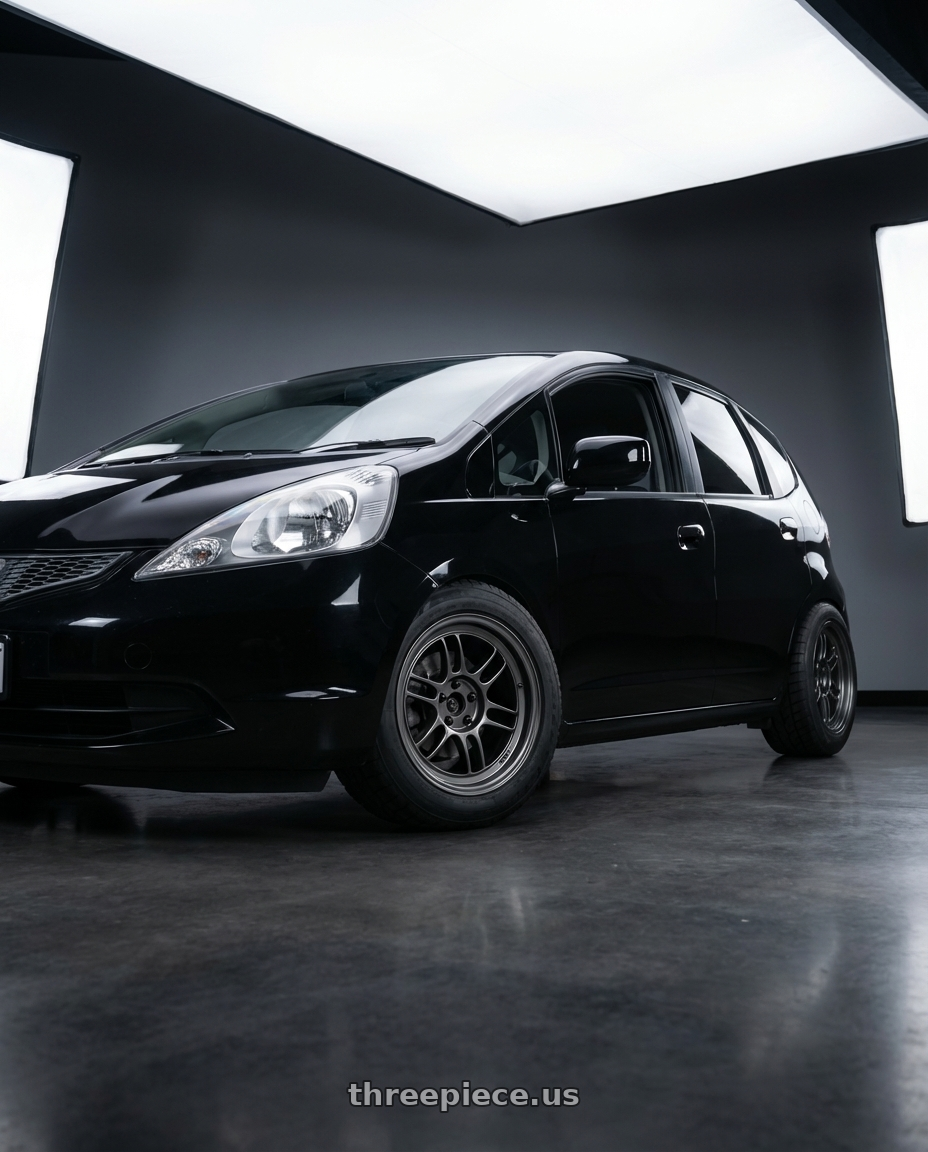 2010 Honda Fit, Black with Enkei RPF1 4x100 15x8+28 Gunmetal wheels