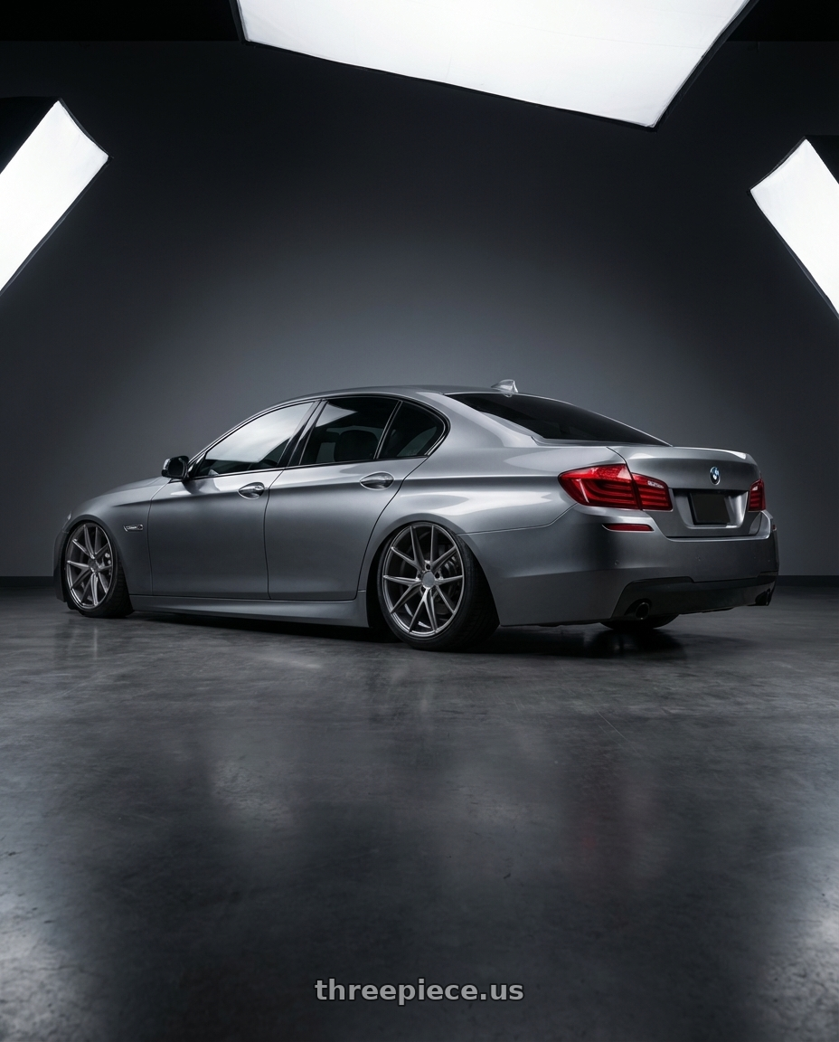 2016 BMW 5 Series F10 with Niche 1PC M116 MISANO 5X120 20X9 +35 MATTE GUN METAL wheels rear three quarter view slight stretch tires