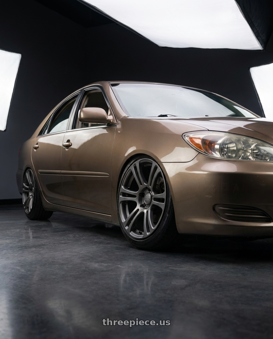 2002 Toyota Camry le bronze with Kansei K16G Neo 5x114.3 18x10.5 22 Gunmetal wheels