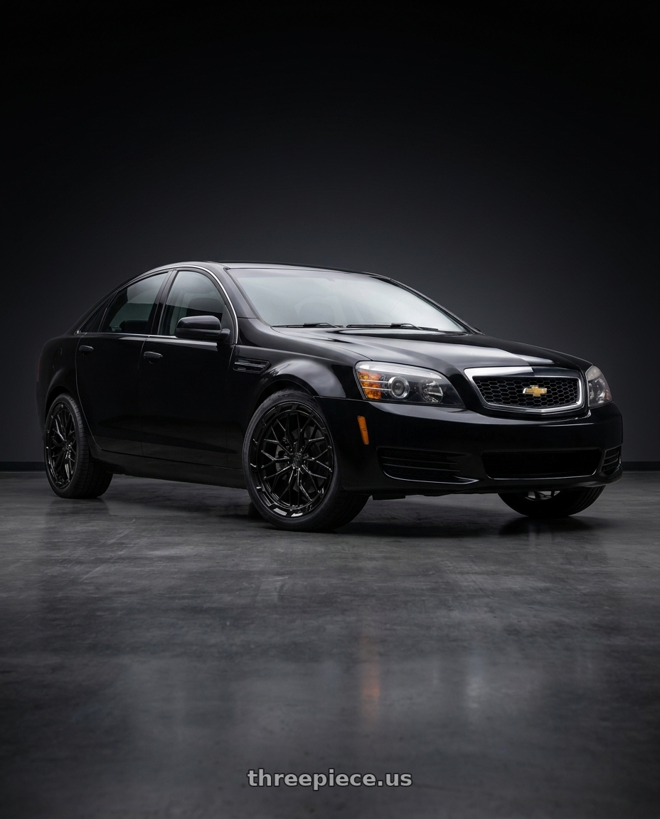2014 Chevrolet Caprice PPV with DOLCE PERFORMANCE MAGARI 5x120 19x8.5 +28 Gloss Black wheels front three quarter view stock stance