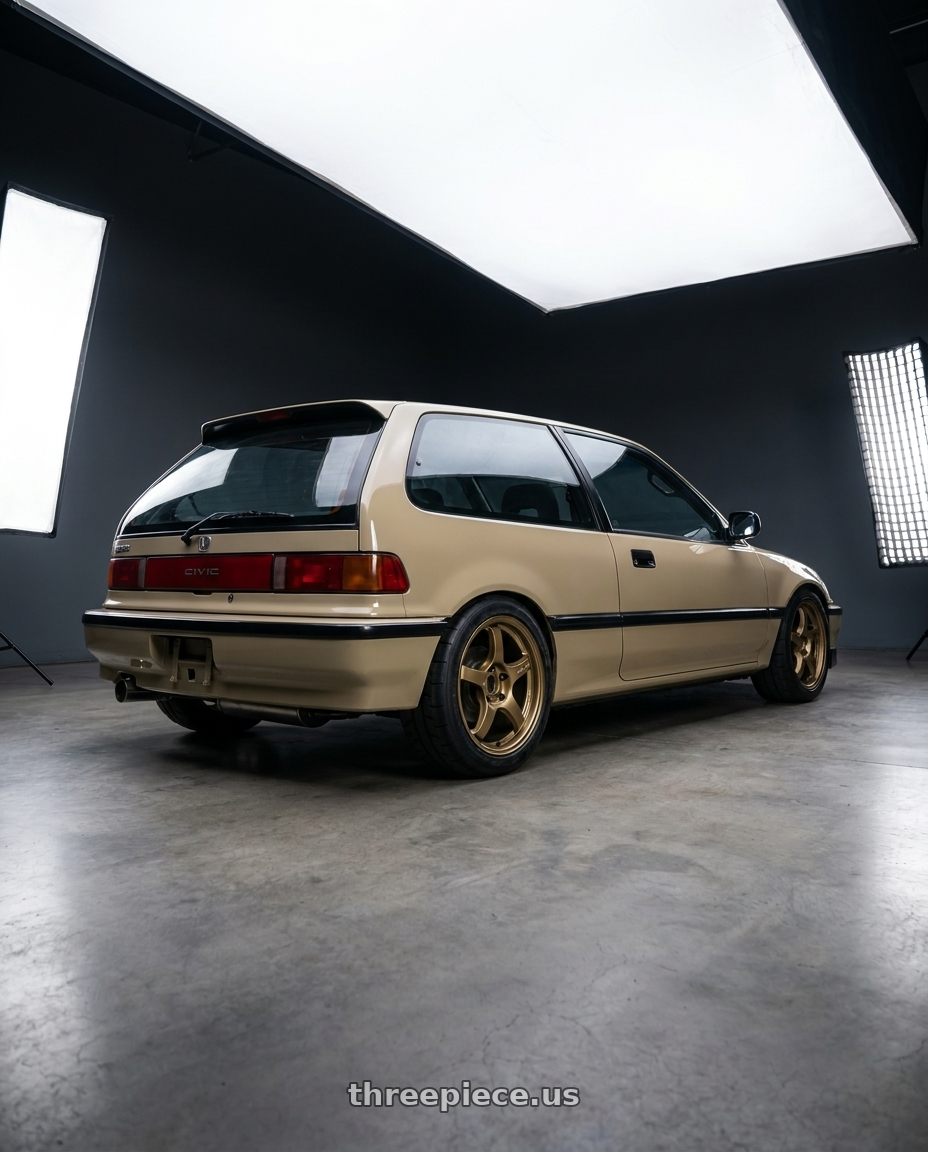 1991 civic hatchback with Gram Lights 57CR 5x114.3 18x9.5 +38 Almite Gold wheels rear three quarter view square tires