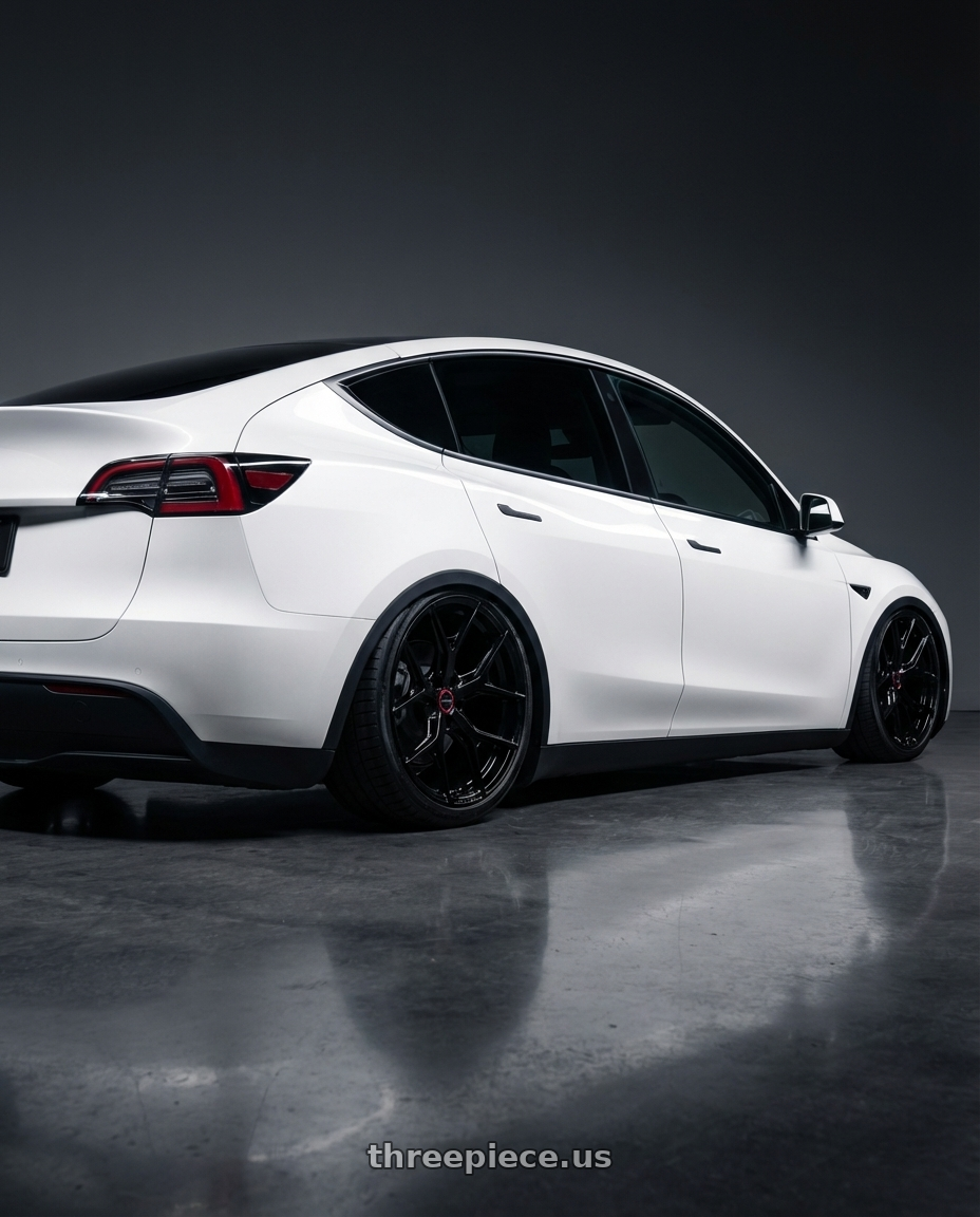 2024 Tesla Model Y with Vossen HF-5 20x9.5 / 5x114.3 / ET25 / Deep Face / 73.1 -GB - Gloss Black Wheel - HF5-0N07 wheels rear three quarter view slight stretch tires