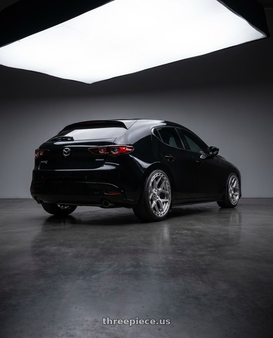 Mazda3 5D 2025  黑色  with 4PLAY 4P55 6x135/6x139.7 22x10-18 Brushed wheels rear three quarter view square tires