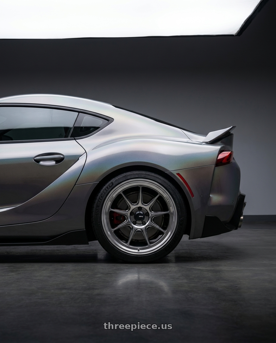 2020 Toyota GR Supra 3 with Konig Countergram 5x112 19x11+40 Hyper Chrome / Machined Lip wheels rear three quarter view square tires