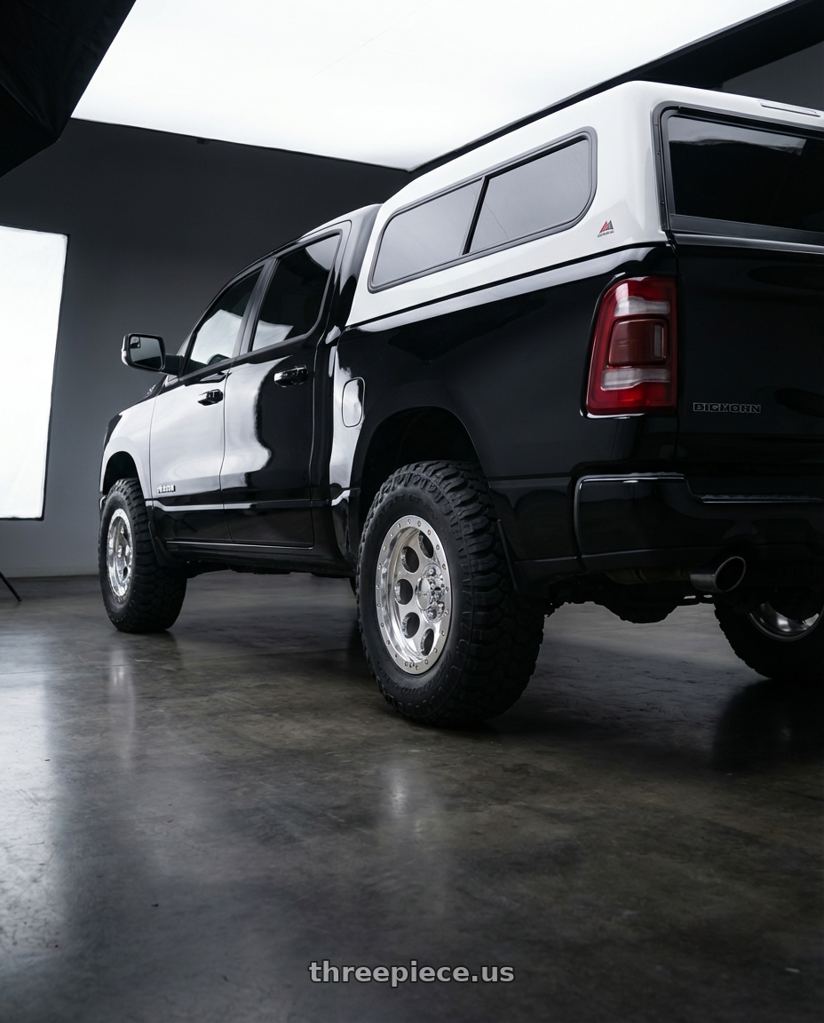 2019 Ram 1500 Bighorn with Mickey Thompson Classic Pro Polished 6x139.7 18x9 +0 Polished. Zinc Bolts wheels rear three quarter view meaty tires
