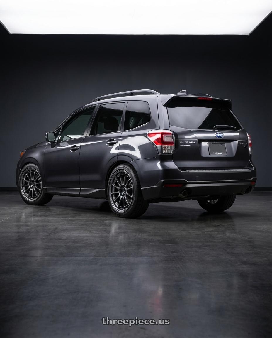 2017 subaru forester xt dark grey metallic with Enkei NT03+M 5x100 18x9.5+40 Gunmetal wheels rear three quarter view slight stretch tires