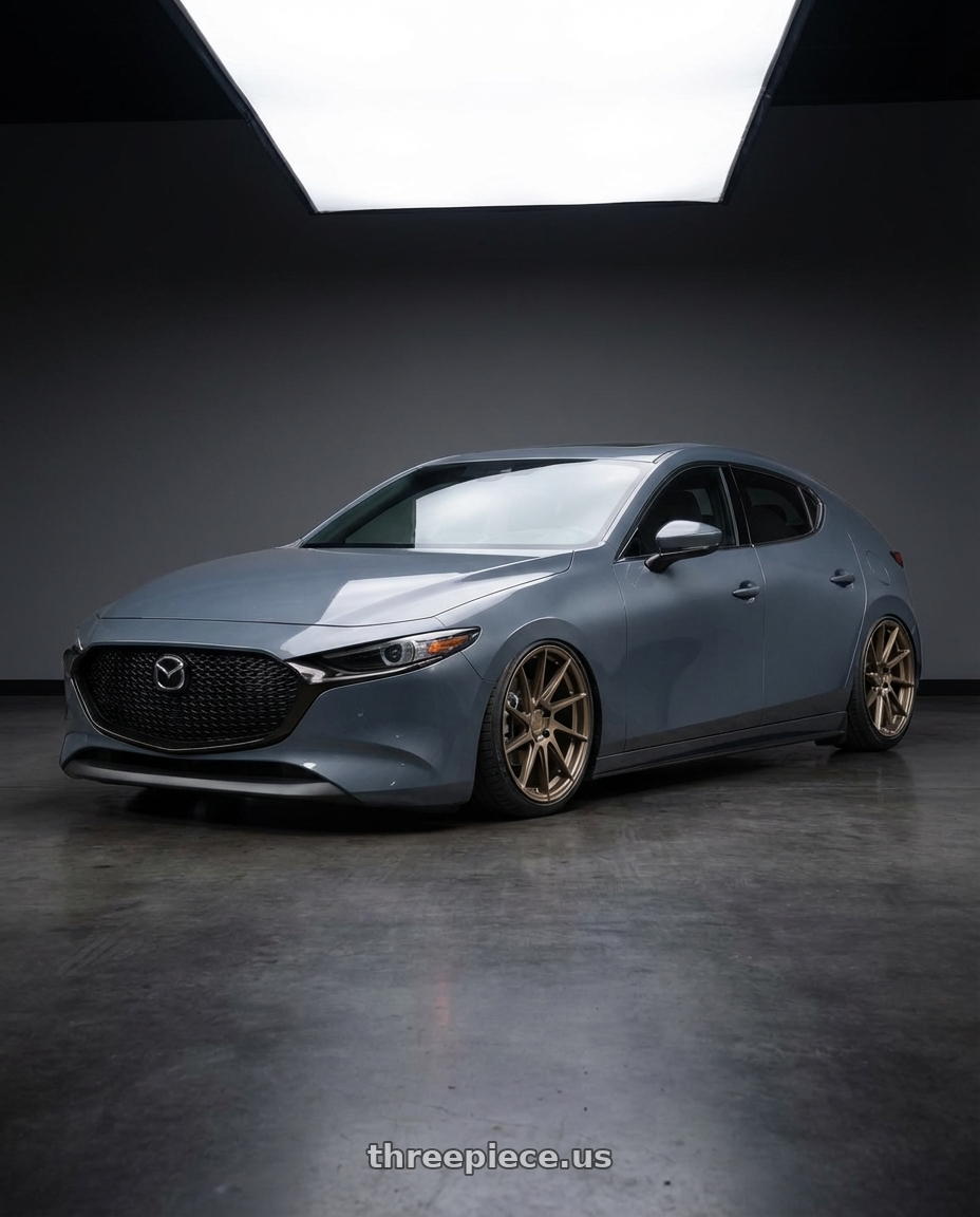 2023 Mazda Mazda3 Turbo with Aodhan AH09 5x114.3 18x8.5 +35 Matte Bronze wheels front three quarter view stanced stance
