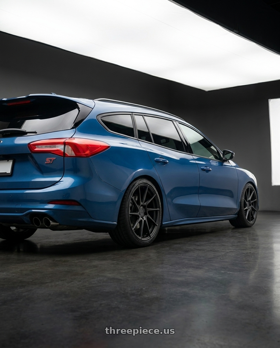 2020 Ford Focus St Wagon with Aodhan AH09 5x114.3 18x8.5 +35 Matte Black wheels rear three quarter view square tires